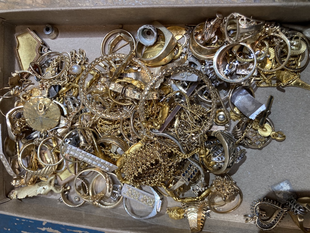 This is our current collection of scrap gold we purchased from customers to use for their redesigned jewelry and remade wedding rings projects.